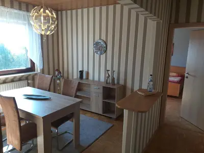 Ein Sitzbereich in der Unterkunft Apartment Zwei Schlafzimmer- Betten in Komforthöhe