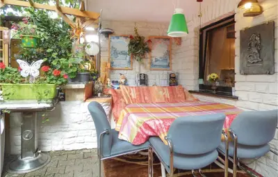 Ein Sitzbereich in der Unterkunft Nice Apartment In Neumagen-Papiermühle