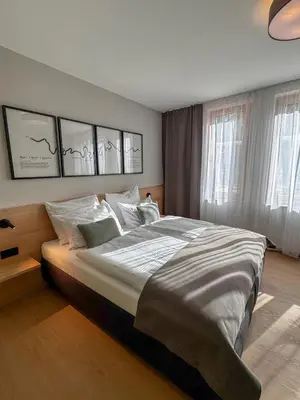 Ein Bett oder Betten in einem Zimmer der Unterkunft JUFA Hotel Bernkastel-Kues