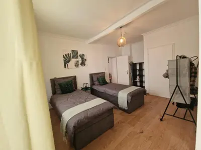 Ein Bett oder Betten in einem Zimmer der Unterkunft Moselzauber Güls