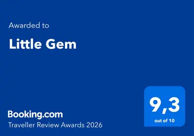 Ein Zertifikat, Auszeichnung, Logo oder anderes Dokument, das in der Unterkunft Little Gem ausgestellt ist