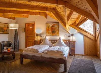 Ein Bett oder Betten in einem Zimmer der Unterkunft Hotel-Restaurant Eifeler Seehütte