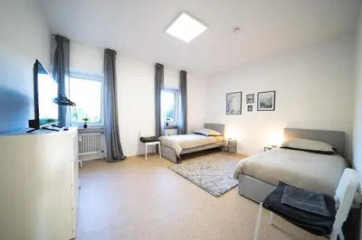 Ein Bett oder Betten in einem Zimmer der Unterkunft DWK: Monteurwohnung Koblenz