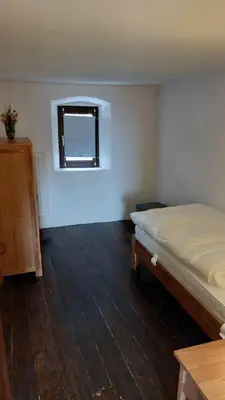 Ein Bett oder Betten in einem Zimmer der Unterkunft Haus Messern