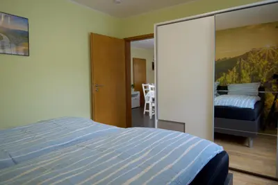Ein Bett oder Betten in einem Zimmer der Unterkunft FEWO Moseleule