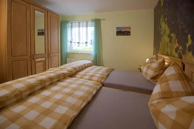 Ein Bett oder Betten in einem Zimmer der Unterkunft FEWO Moseleule