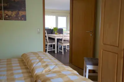 Ein Bett oder Betten in einem Zimmer der Unterkunft FEWO Moseleule