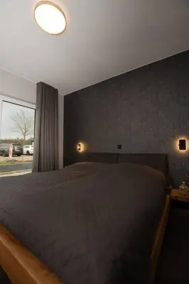 Ein Bett oder Betten in einem Zimmer der Unterkunft Moderne Wohnung mit Panorama