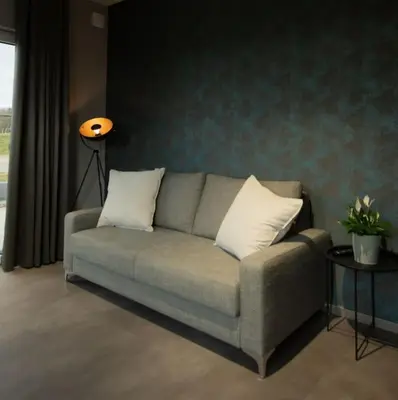 Ein Sitzbereich in der Unterkunft Moderne Wohnung mit Panorama