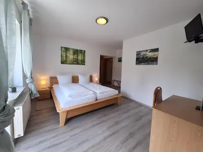 Ein Bett oder Betten in einem Zimmer der Unterkunft Hotel | Restaurant | Forellenzucht