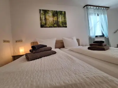 Ein Bett oder Betten in einem Zimmer der Unterkunft Hotel | Restaurant | Forellenzucht