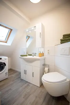 Ein Badezimmer in der Unterkunft Queensize Bett & Netflix zentral
