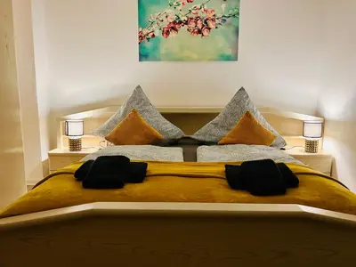 Ein Bett oder Betten in einem Zimmer der Unterkunft 2 Zimmer Ferienwohnung Denis 2