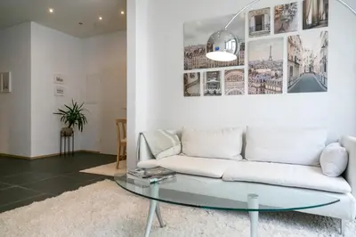 Ein Sitzbereich in der Unterkunft I Innenstadt I King-Size-Bett I