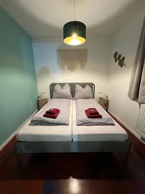 Ein Bett oder Betten in einem Zimmer der Unterkunft Relaxen im Weindorf Mayschoß Fewo 1