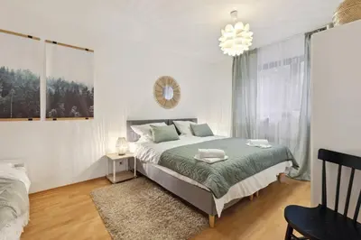 Ein Bett oder Betten in einem Zimmer der Unterkunft DDHomes LahnLiebe App 01 - Balkon,Therme,SmartTV