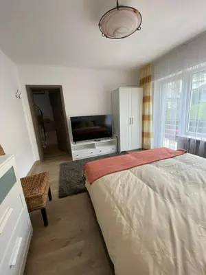 Ein Bett oder Betten in einem Zimmer der Unterkunft Pension mit Moselblick