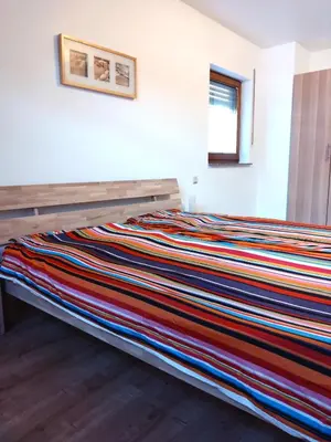 Ein Bett oder Betten in einem Zimmer der Unterkunft Ferienwohnung Veldenz