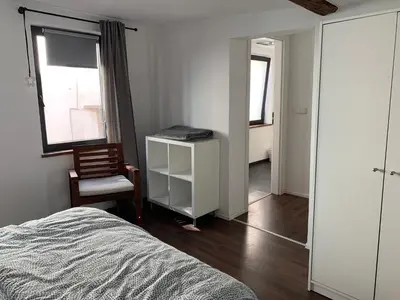 Ein Bett oder Betten in einem Zimmer der Unterkunft Fischerhaus in der Altstadt