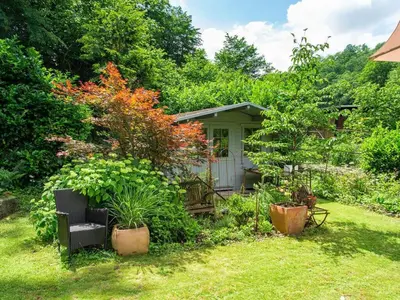 Ein Garten an der Unterkunft Romantic apartment with balcony