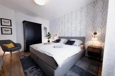 Ein Bett oder Betten in einem Zimmer der Unterkunft Racing-Apartment (Ferienwohnung)