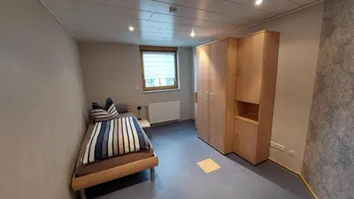Ein Bett oder Betten in einem Zimmer der Unterkunft Ferienwohnung Rhens am Rhein