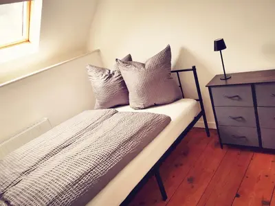 Ein Bett oder Betten in einem Zimmer der Unterkunft Ferienhaus VioLin