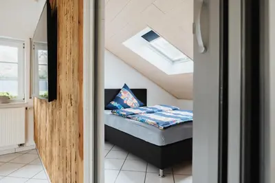 Ein Bett oder Betten in einem Zimmer der Unterkunft Ferienwohnung Krist