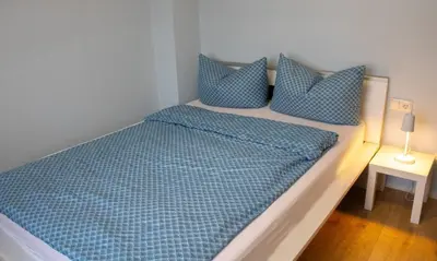 Ein Bett oder Betten in einem Zimmer der Unterkunft Ferienhaus Eifeljeföhl