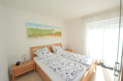 Ein Bett oder Betten in einem Zimmer der Unterkunft Ferienhaus Panorama Mosel