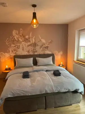 Ein Bett oder Betten in einem Zimmer der Unterkunft Ferienwohnung Clemens