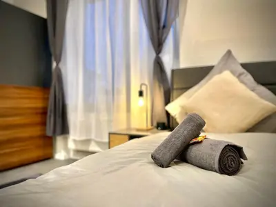 Ein Bett oder Betten in einem Zimmer der Unterkunft G&G Luxury Apartment am Stadtpark Bendorf