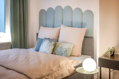 Ein Bett oder Betten in einem Zimmer der Unterkunft Koblenz' Größte, 5 SZ, HBF, ideal für Gruppen & Firmen