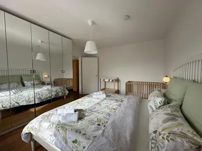 Ein Bett oder Betten in einem Zimmer der Unterkunft Ferienwohnung Panorama Oberkirn