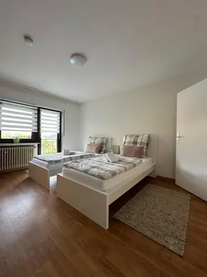 Ein Bett oder Betten in einem Zimmer der Unterkunft Ferienwohnung Panorama Oberkirn