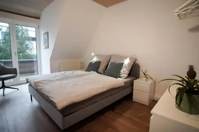 Ein Bett oder Betten in einem Zimmer der Unterkunft Suite Katharina