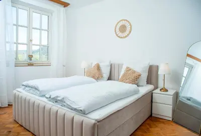 Ein Bett oder Betten in einem Zimmer der Unterkunft Villa Ardoise direkt an der Mosel zwischen Cochem und Koblenz