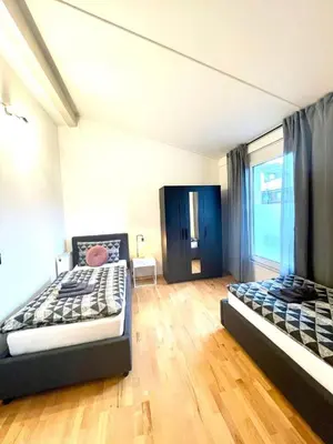 Ein Bett oder Betten in einem Zimmer der Unterkunft Geräumiges Ferienhaus in Koblenz