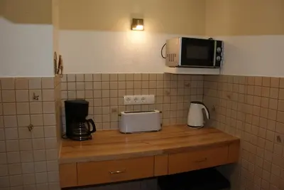 Küche/Küchenzeile in der Unterkunft Moselblick - Ferienwohnung an der Uferpromenade
