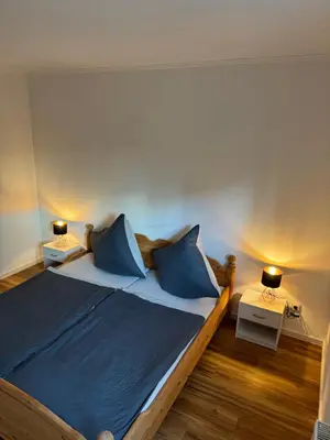 Ein Bett oder Betten in einem Zimmer der Unterkunft Adenauer Forst Ring Apartment
