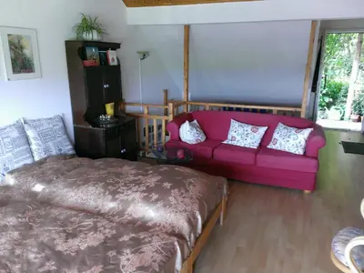 Ein Bett oder Betten in einem Zimmer der Unterkunft Ferienwohnungen Willrich