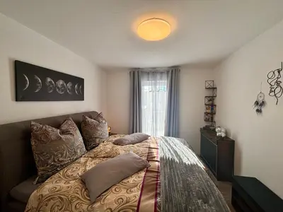 Ein Bett oder Betten in einem Zimmer der Unterkunft Wohlfühlen am Gartenteich
