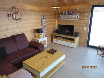 Ein Sitzbereich in der Unterkunft Ferienhaus Merlin