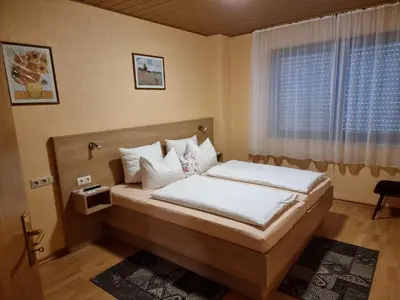 Ein Bett oder Betten in einem Zimmer der Unterkunft Fewo-central-traben