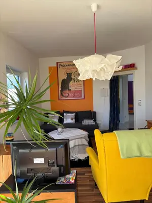 Ein Sitzbereich in der Unterkunft Sonnen-Ferienwohnung