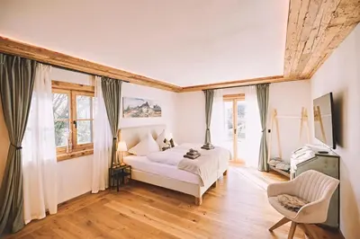 Ein Bett oder Betten in einem Zimmer der Unterkunft Maja Chalets - Altholzchalet in der Eifel mit Whirlpool und Sauna