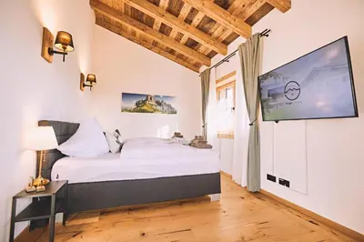 Ein Bett oder Betten in einem Zimmer der Unterkunft Maja Chalets - Altholzchalet in der Eifel mit Whirlpool und Sauna