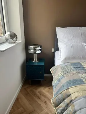 Ein Bett oder Betten in einem Zimmer der Unterkunft Julia's Mosel Villa Appartment MARK