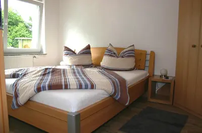 Ein Bett oder Betten in einem Zimmer der Unterkunft Apartment Kraemer Dax