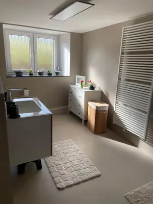 Ein Bett oder Betten in einem Zimmer der Unterkunft Quiddelbacher Mühle